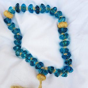 ..Man made turquoise glass necklace